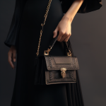 flayr__httpss.mj.runDpLuyW7R6gU_model_holding_black_bag_with__e5d958df-ac28-4a46-a2a4-77176cf968fb_3